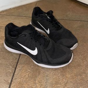 Women’s black Nike running shoes